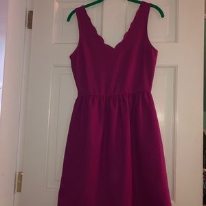 Purple dress with a scalloped v neck